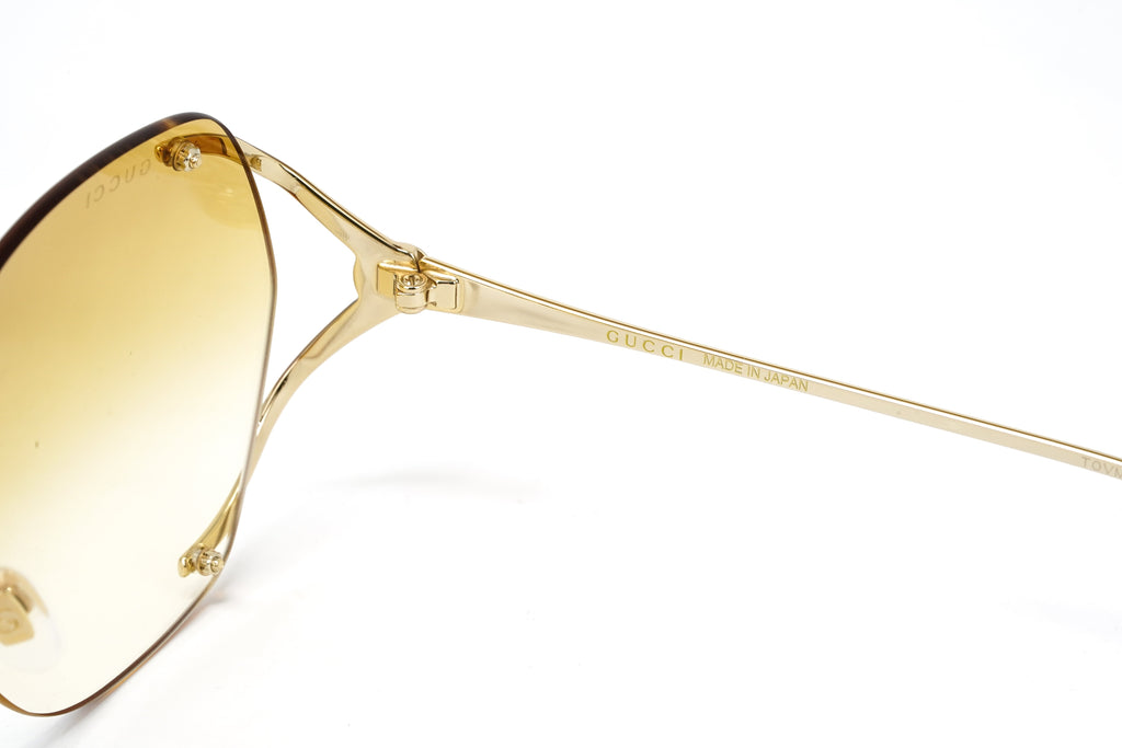 Gucci Women's Sunglasses Oversized Oval Gold