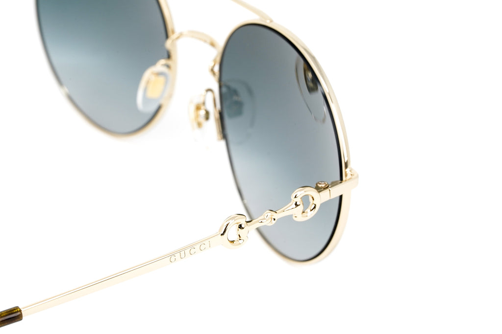 Gucci Women's Sunglasses Round Gold